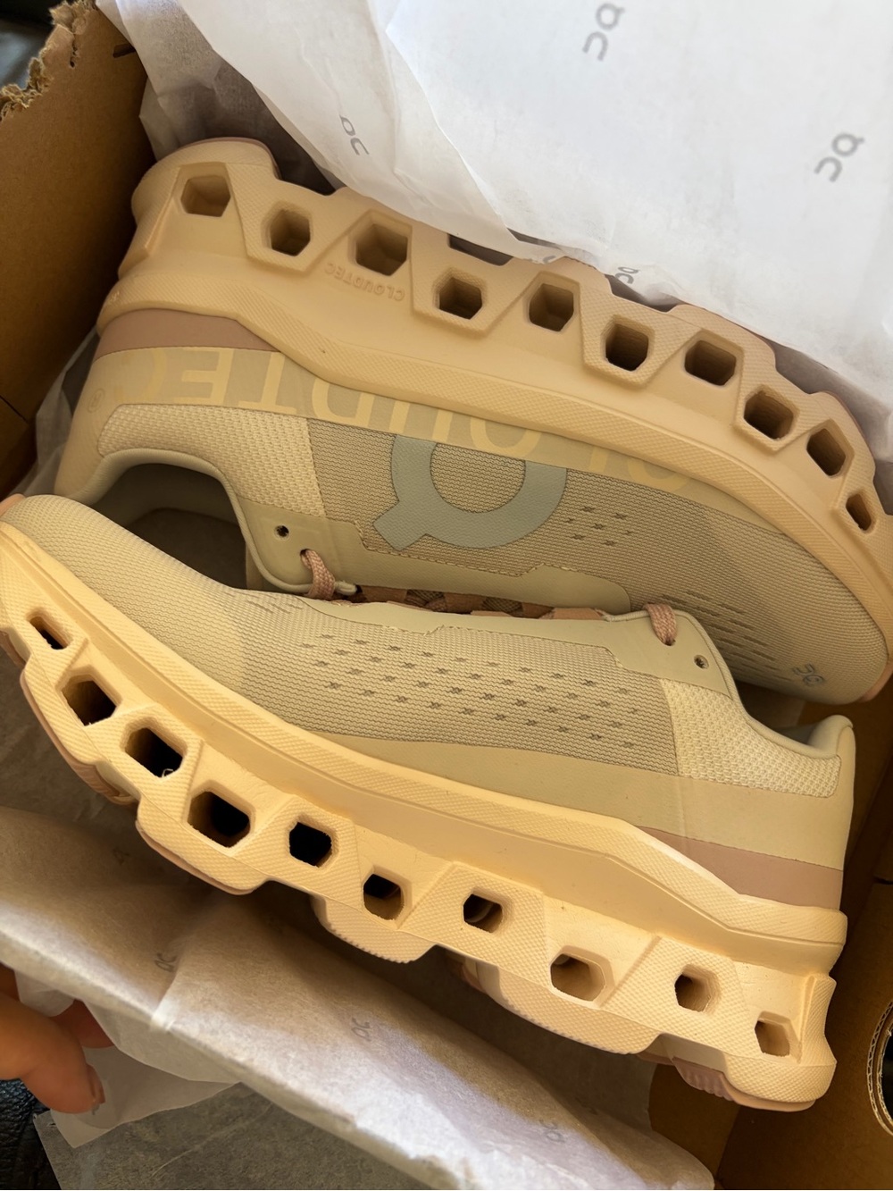 On Running womens Cloudmonster Lightweight Sneakers in Tan